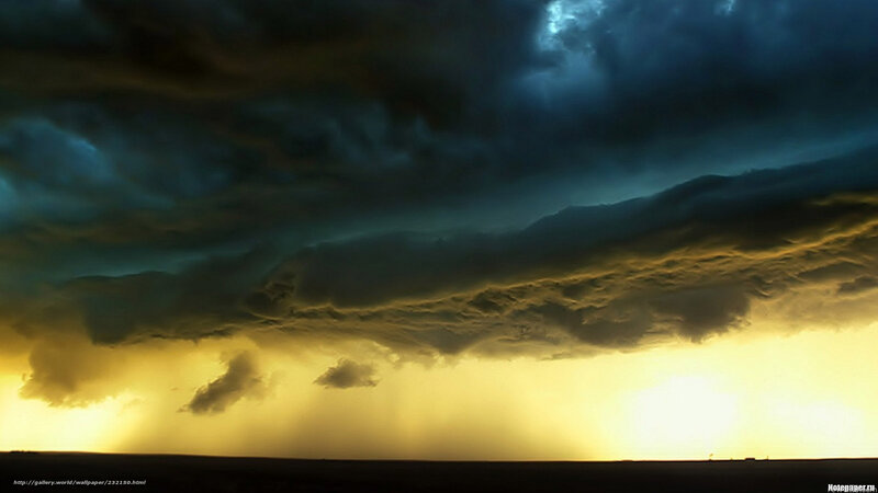dramatic storm clouds at sunset