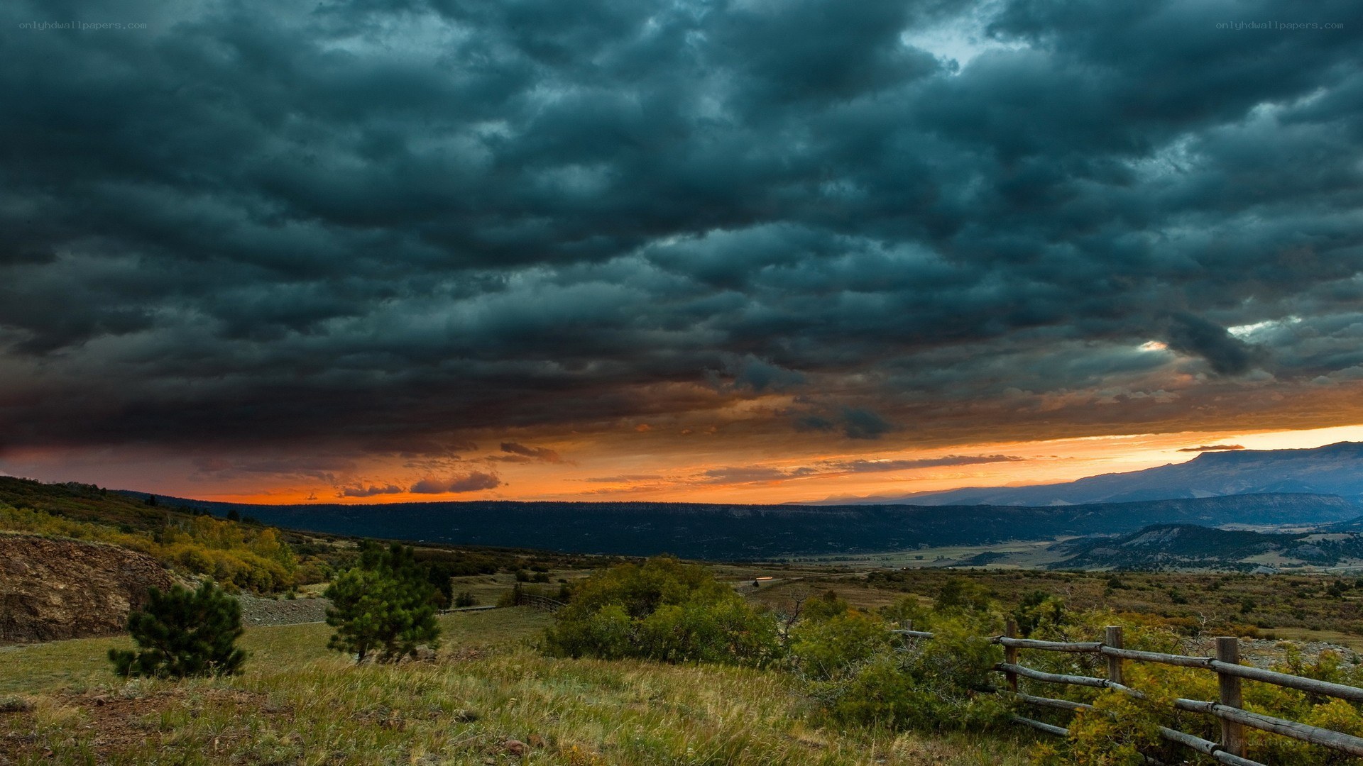 Dramatic storm clouds over a valley