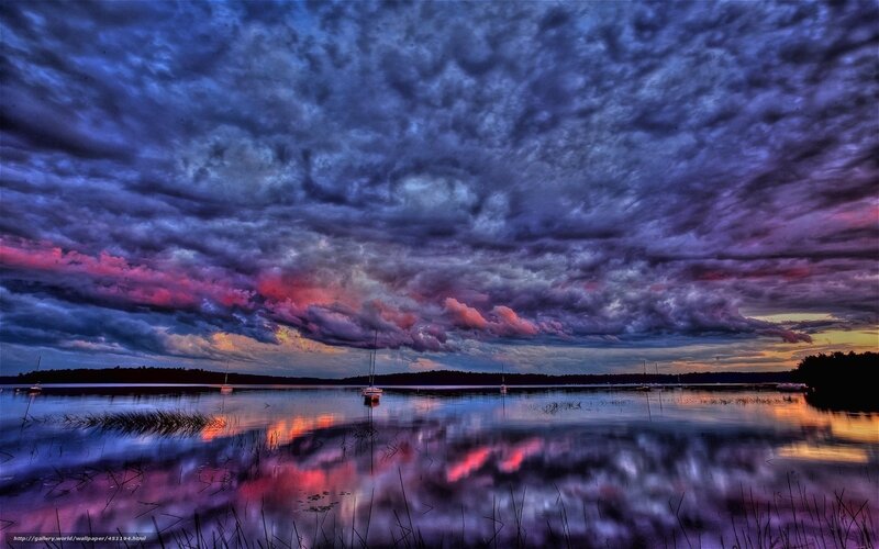 Dramatic storm clouds over lake
