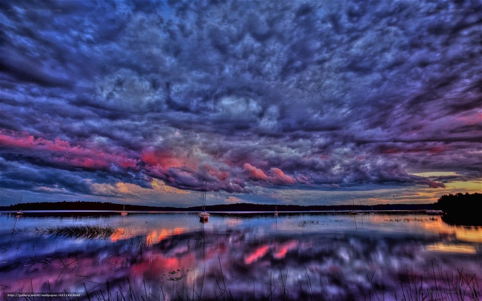 Dramatic storm clouds over lake