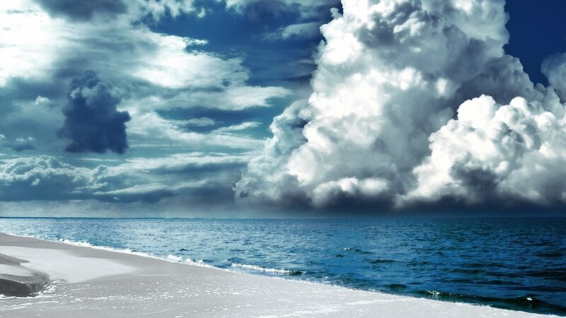 dramatic storm clouds over ocean