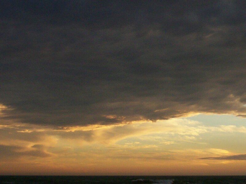 dramatic storm clouds over ocean