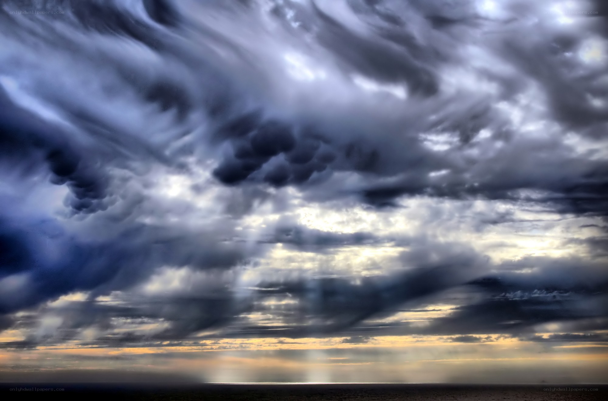 Dramatic storm clouds over sea