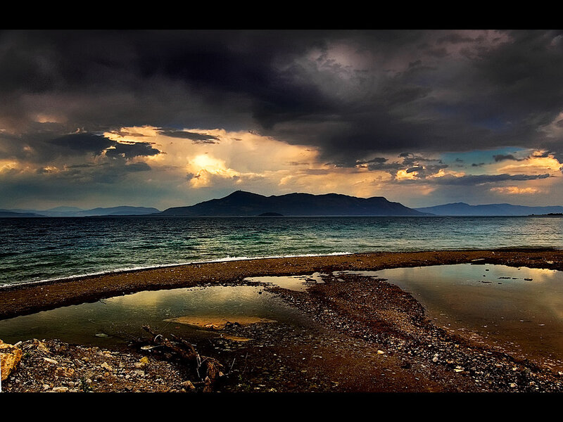 Dramatic storm over a coastal landscape