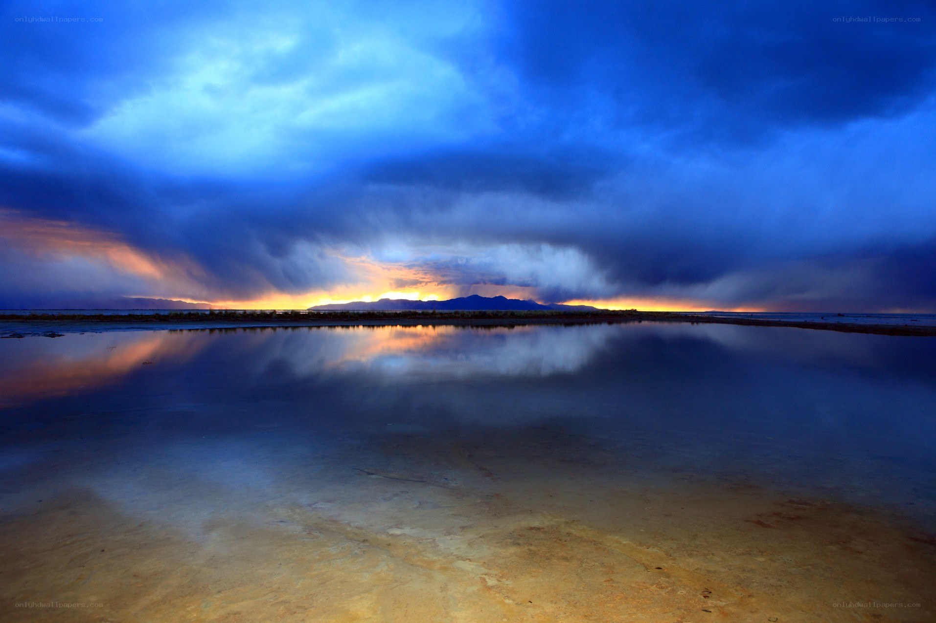 Dramatic storm over a reflective lake