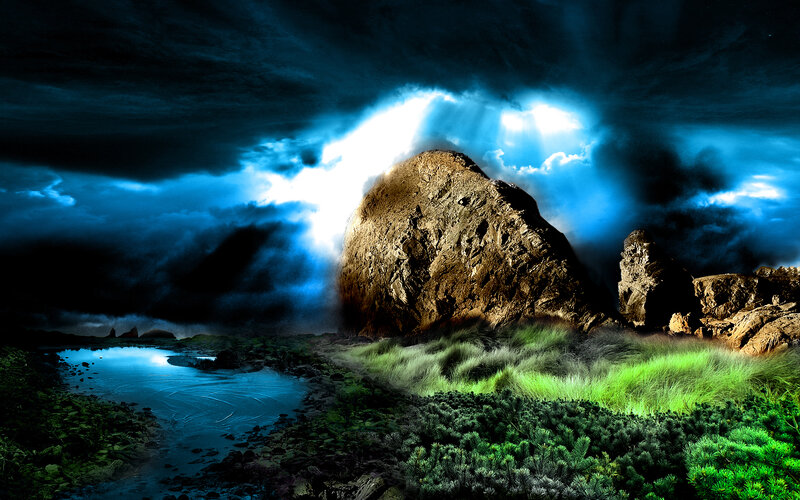 Dramatic storm over rocky landscape