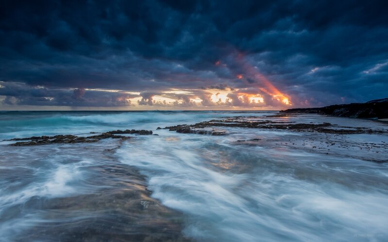 Dramatic stormy sunset at the coast