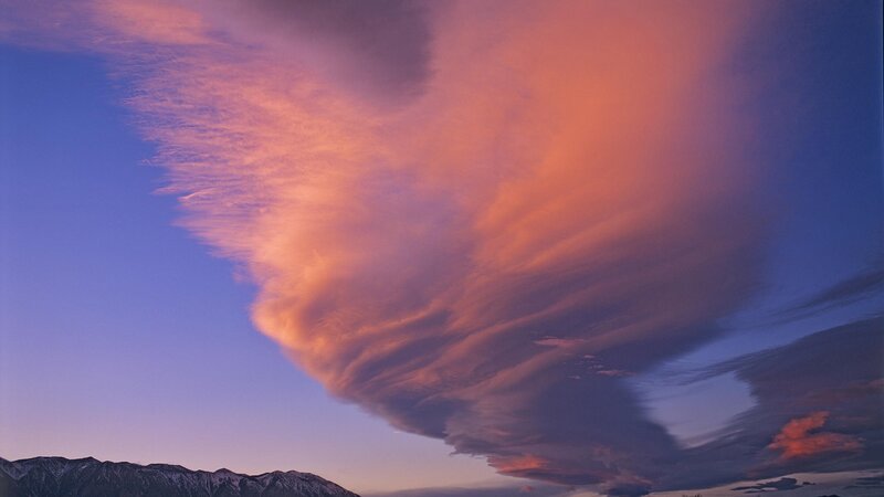 Dramatic sunset cloud over mountains