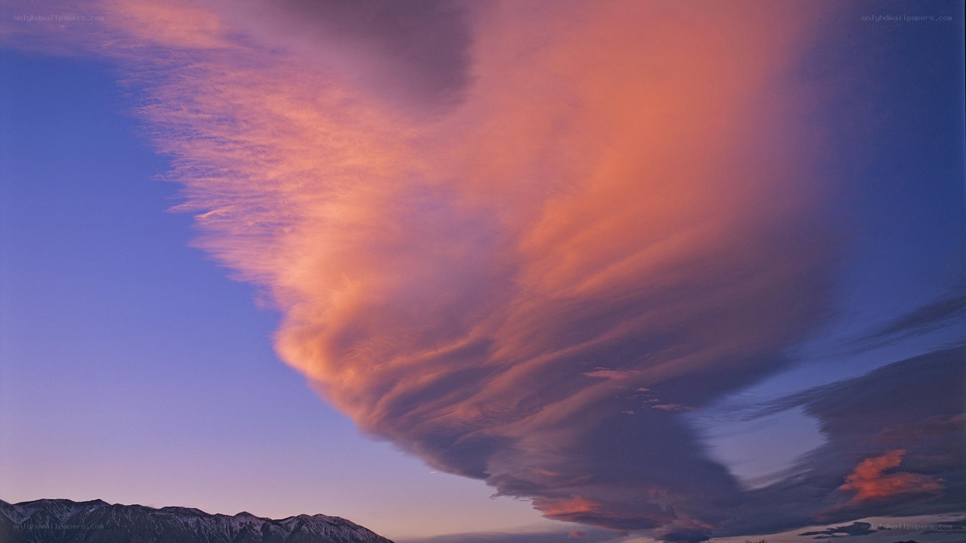 Dramatic sunset cloud over mountains