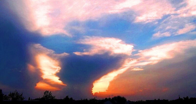 Dramatic Sunset Clouds — Blue