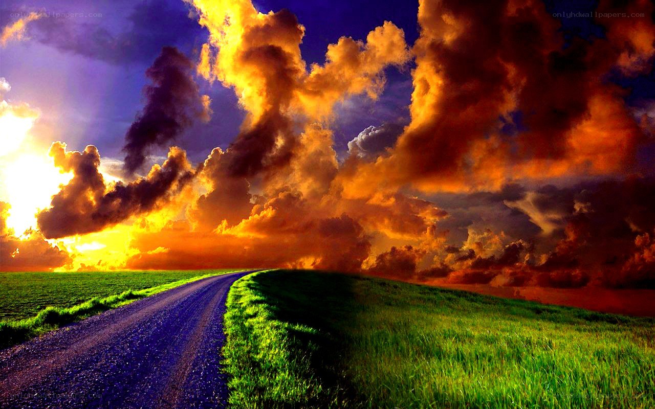 Dramatic sunset over a country road