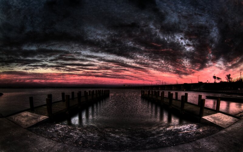 dramatic sunset over a dock