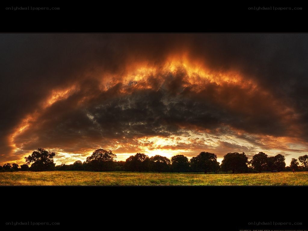 Dramatic sunset over a field