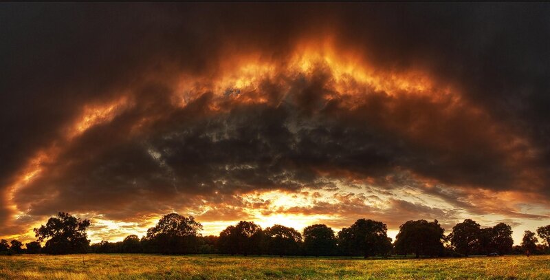 Dramatic sunset over a field