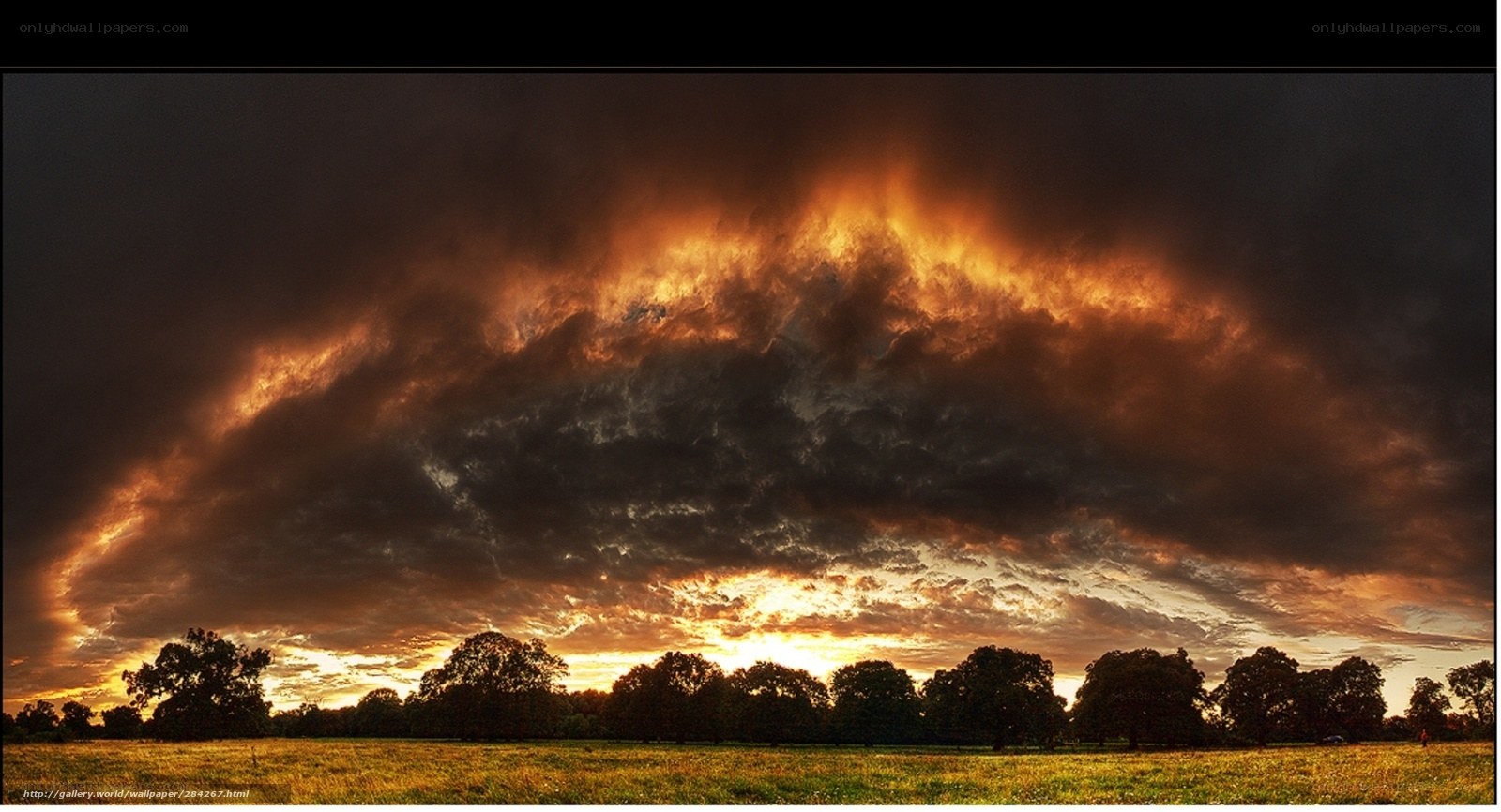 Dramatic sunset over a field