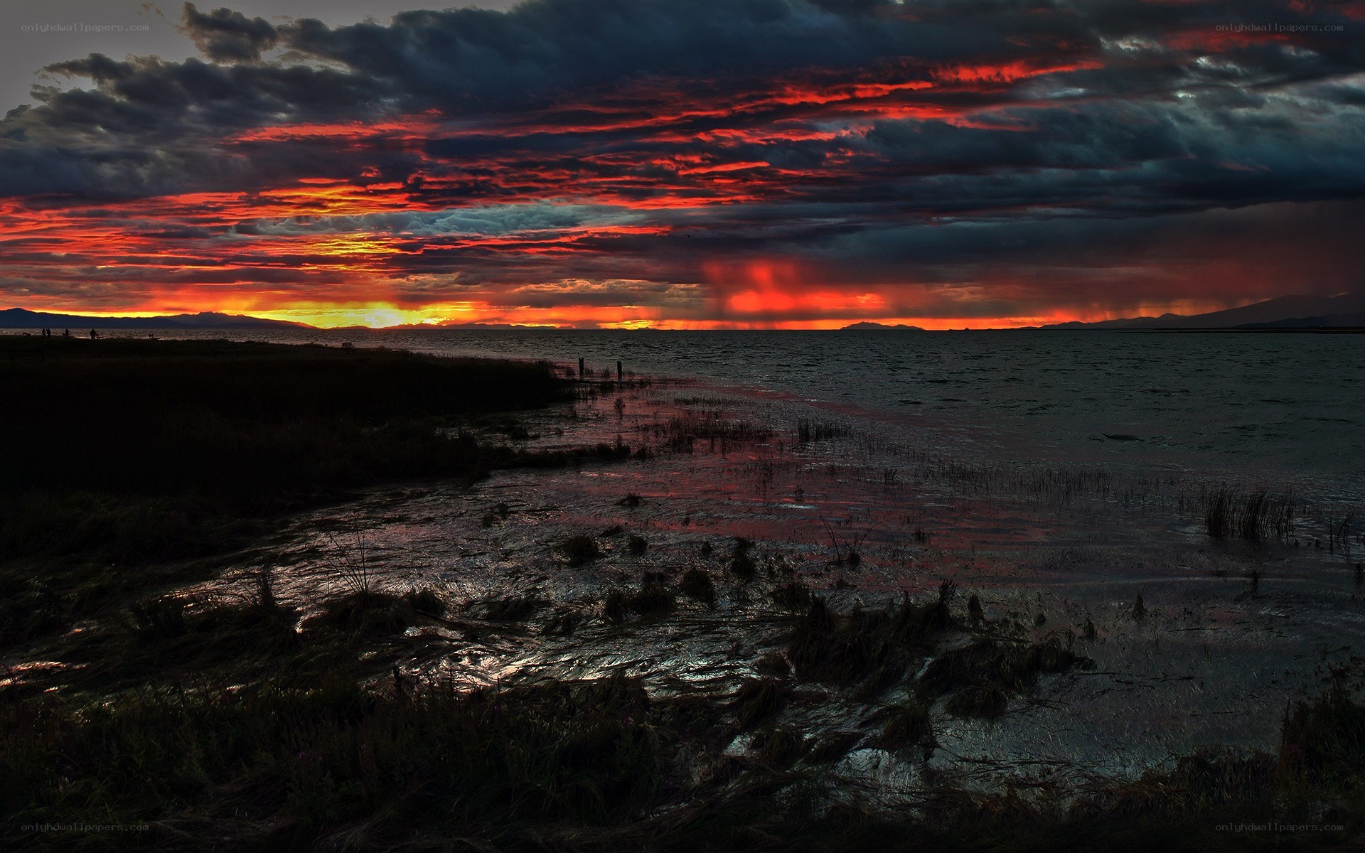 dramatic sunset over a lake