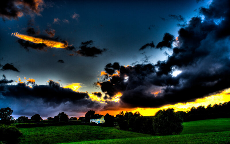 Dramatic sunset over a rural landscape