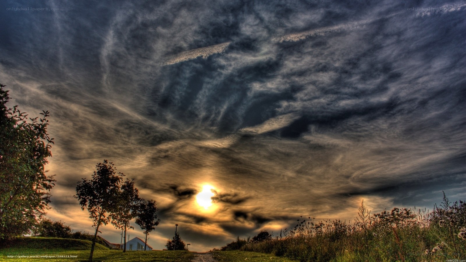 Dramatic sunset over a rural landscape