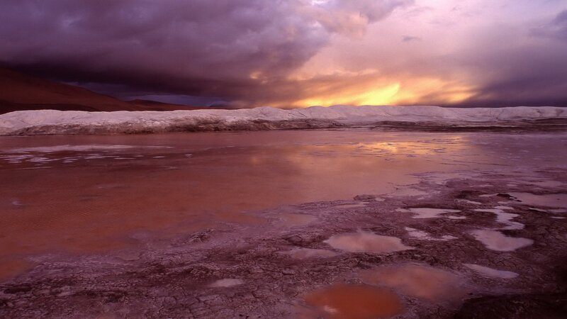 dramatic sunset over a salt flat