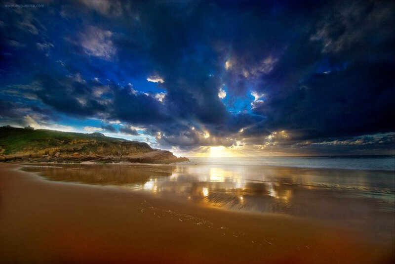Dramatic sunset over a sandy beach