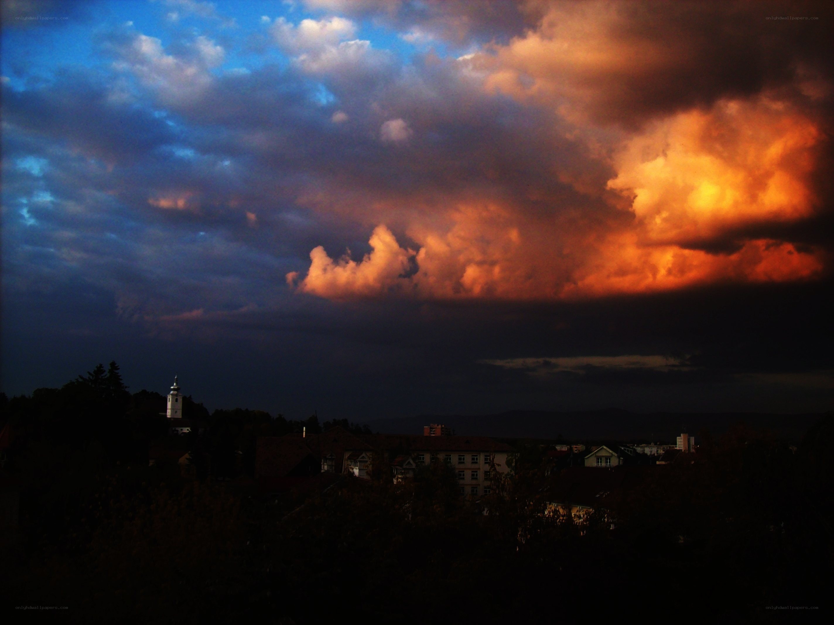 Dramatic sunset over a town