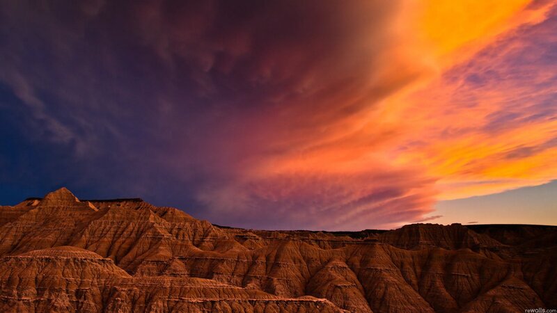 Dramatic sunset over badlands