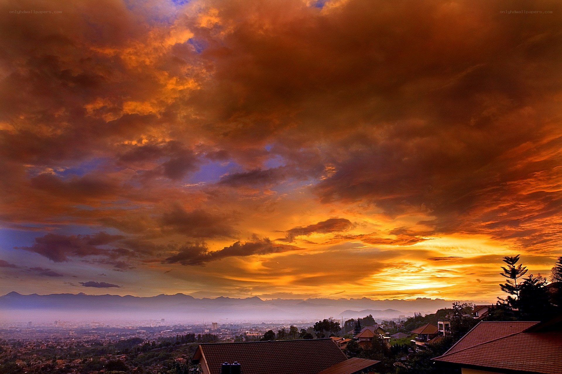 Dramatic sunset over city