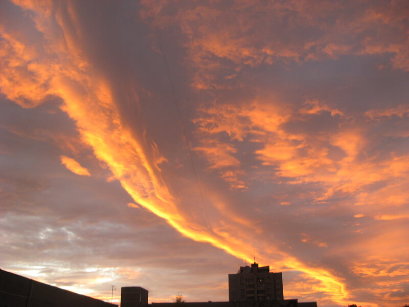 dramatic sunset over city