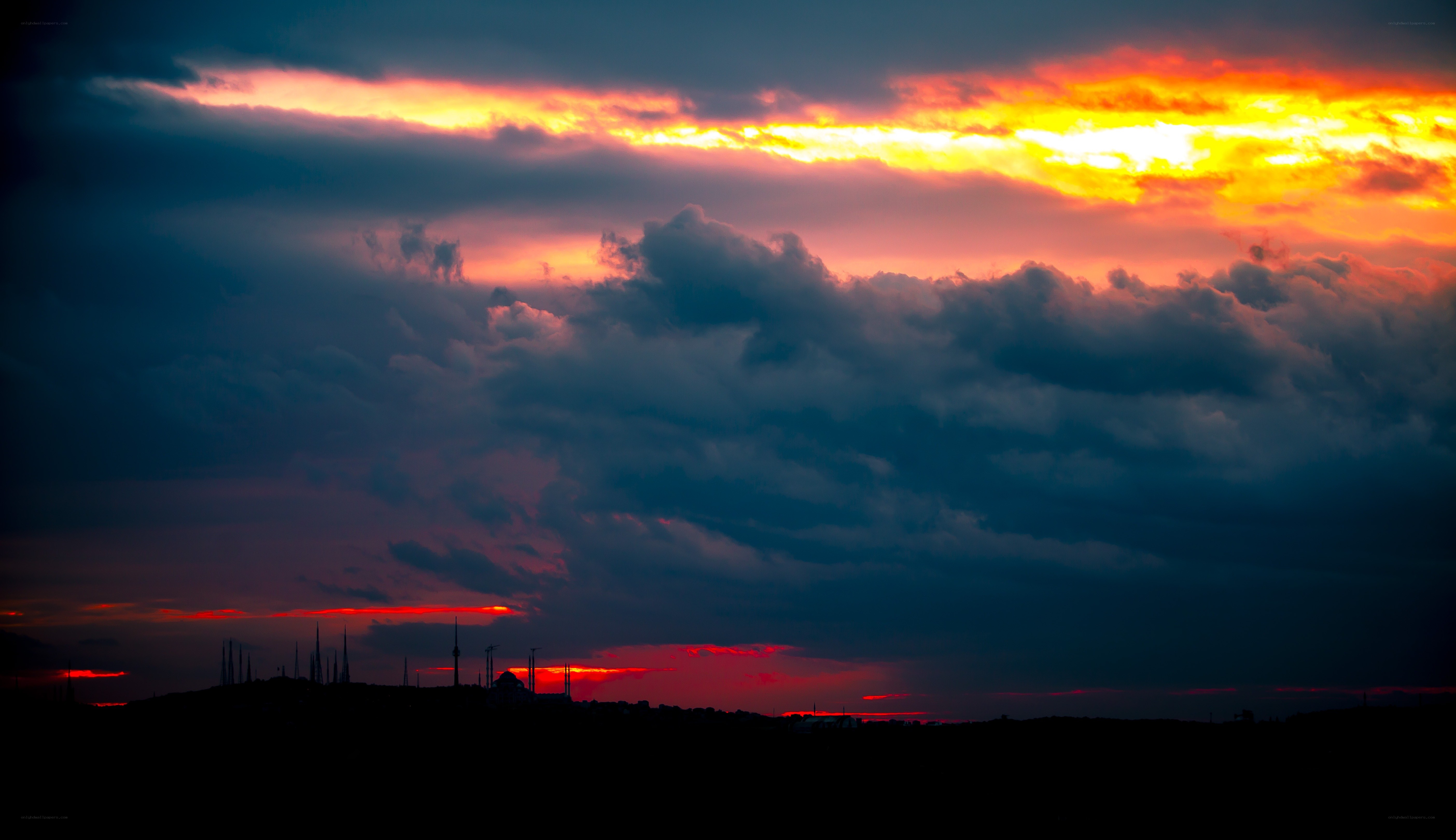 dramatic sunset over city