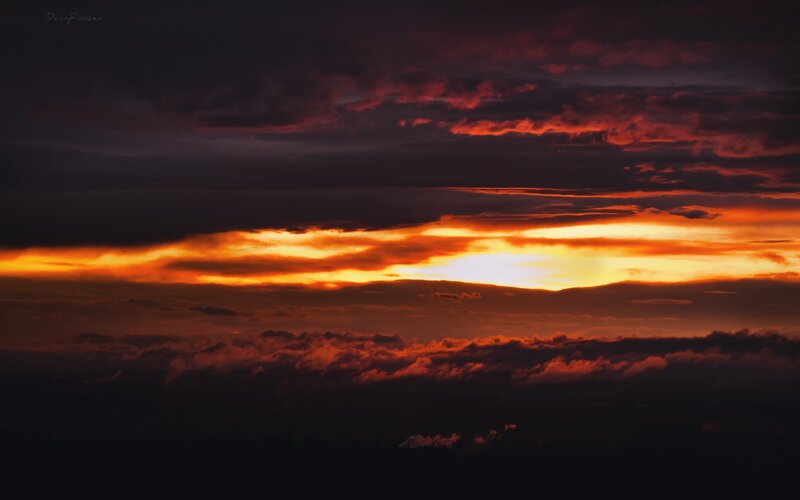 dramatic sunset over clouds