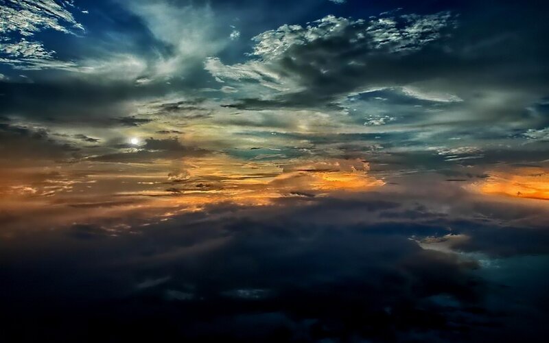 dramatic sunset over clouds