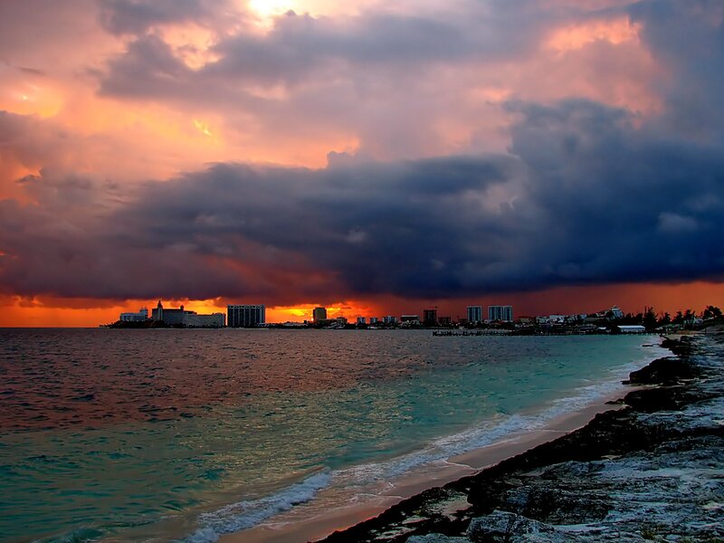dramatic sunset over coastal city
