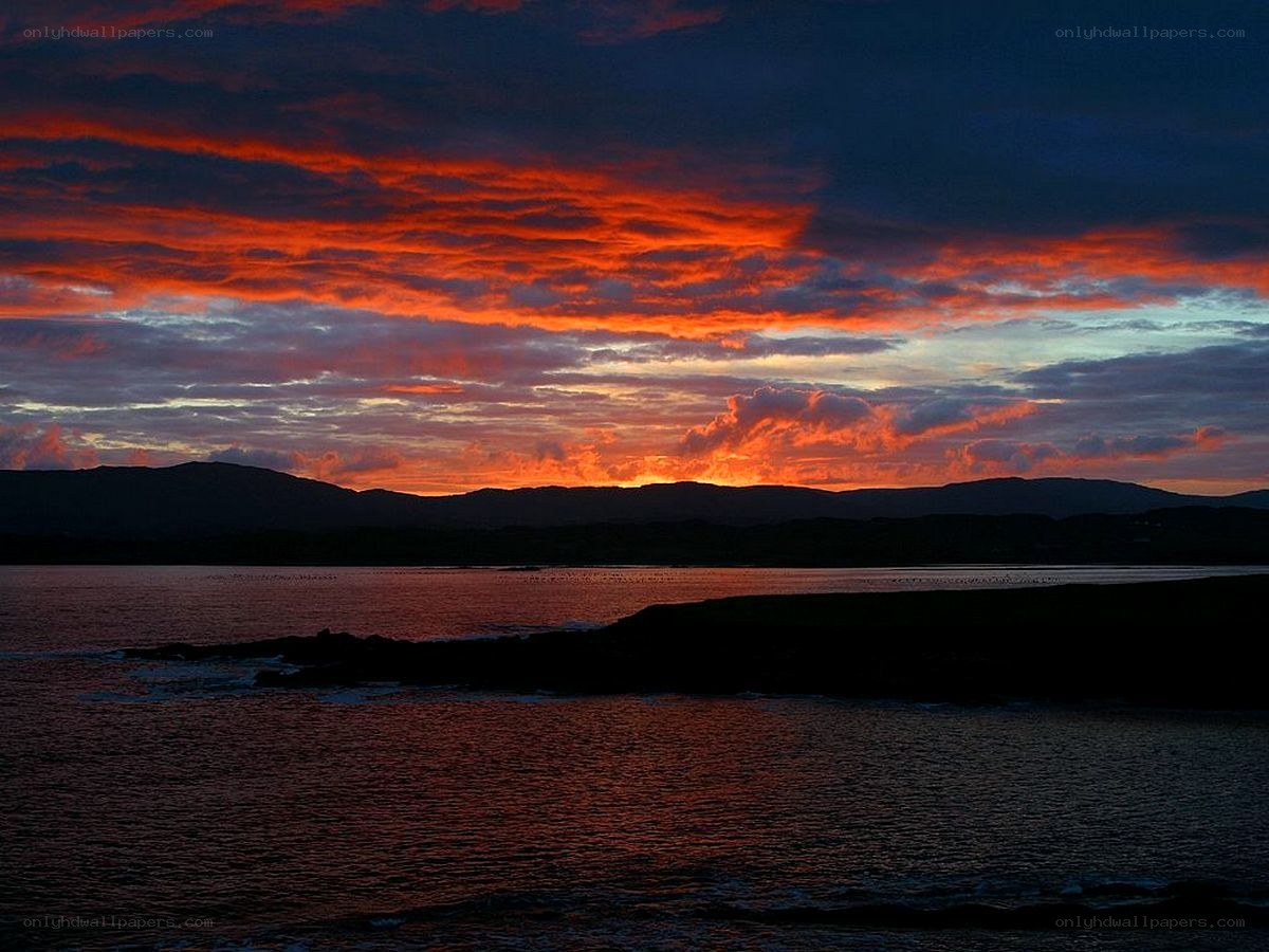 dramatic sunset over coastal waters
