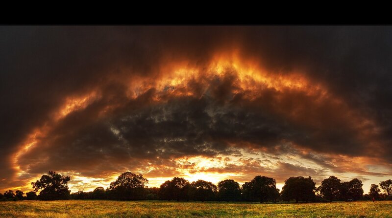 Dramatic Sunset over Field
