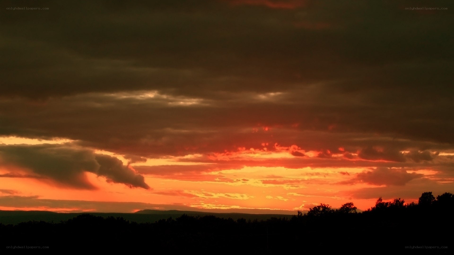 dramatic sunset over hills