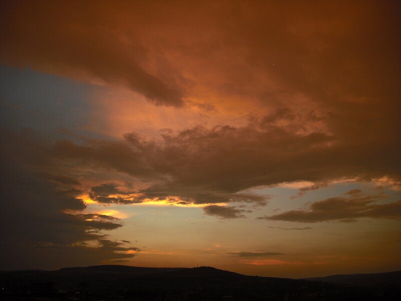 dramatic sunset over hills