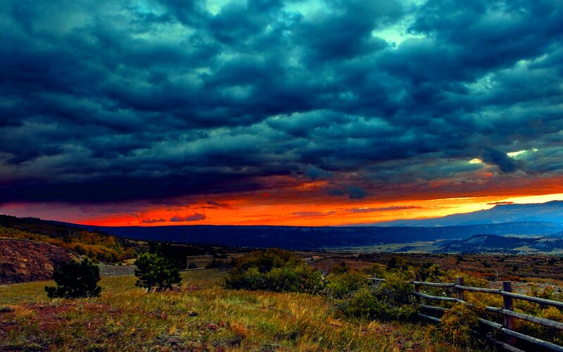 Dramatic Sunset over Hills — Orange