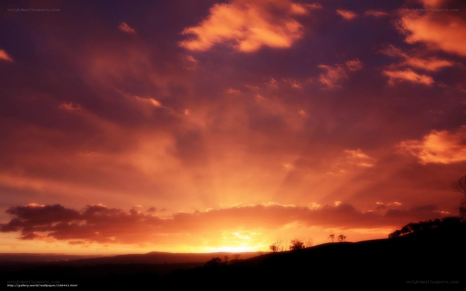dramatic sunset over hills