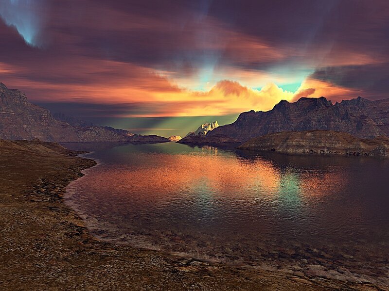 dramatic sunset over mountain lake