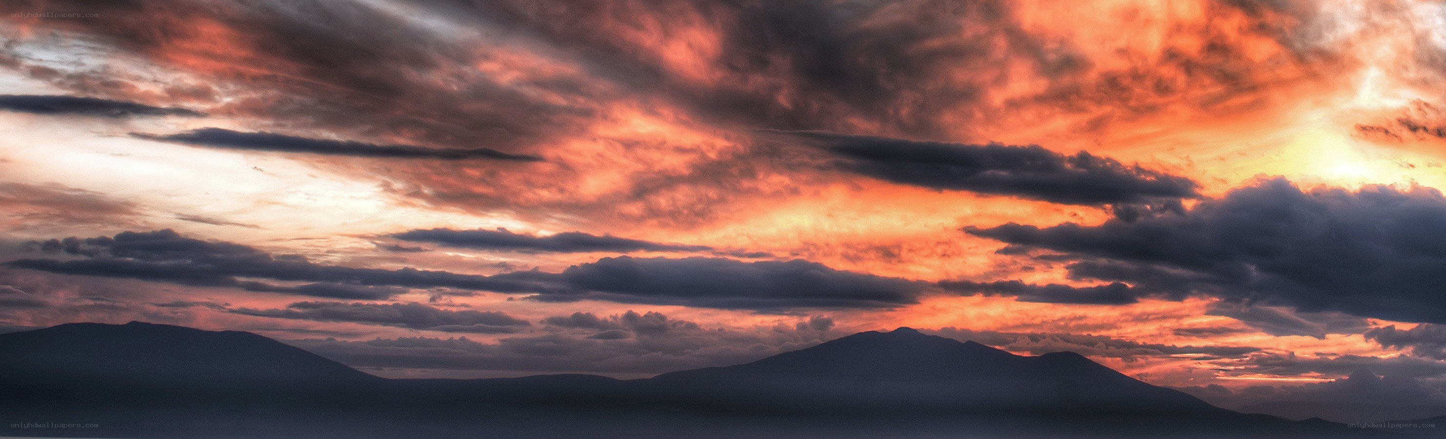 dramatic sunset over mountains