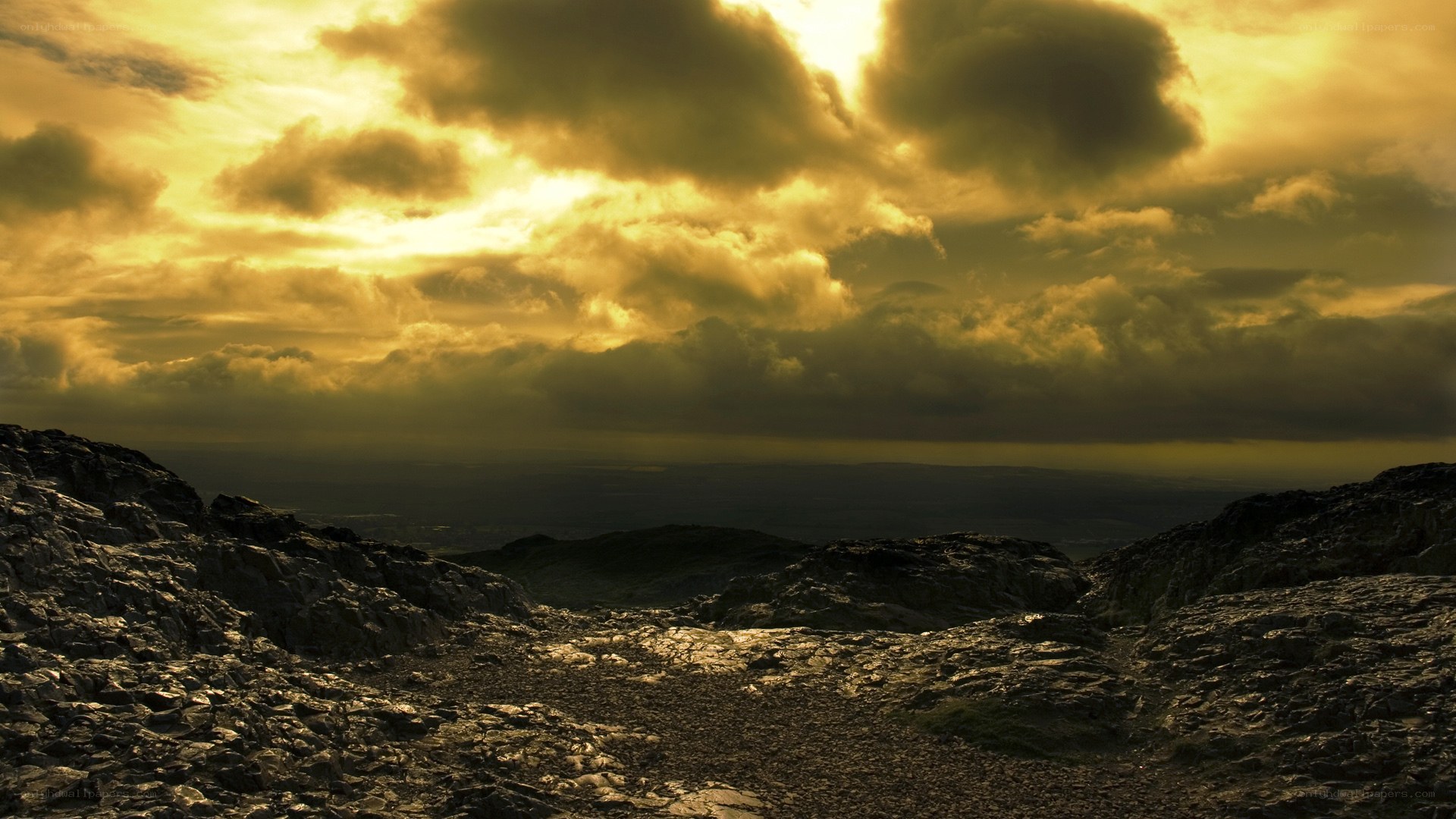 Dramatic sunset over rocky terrain