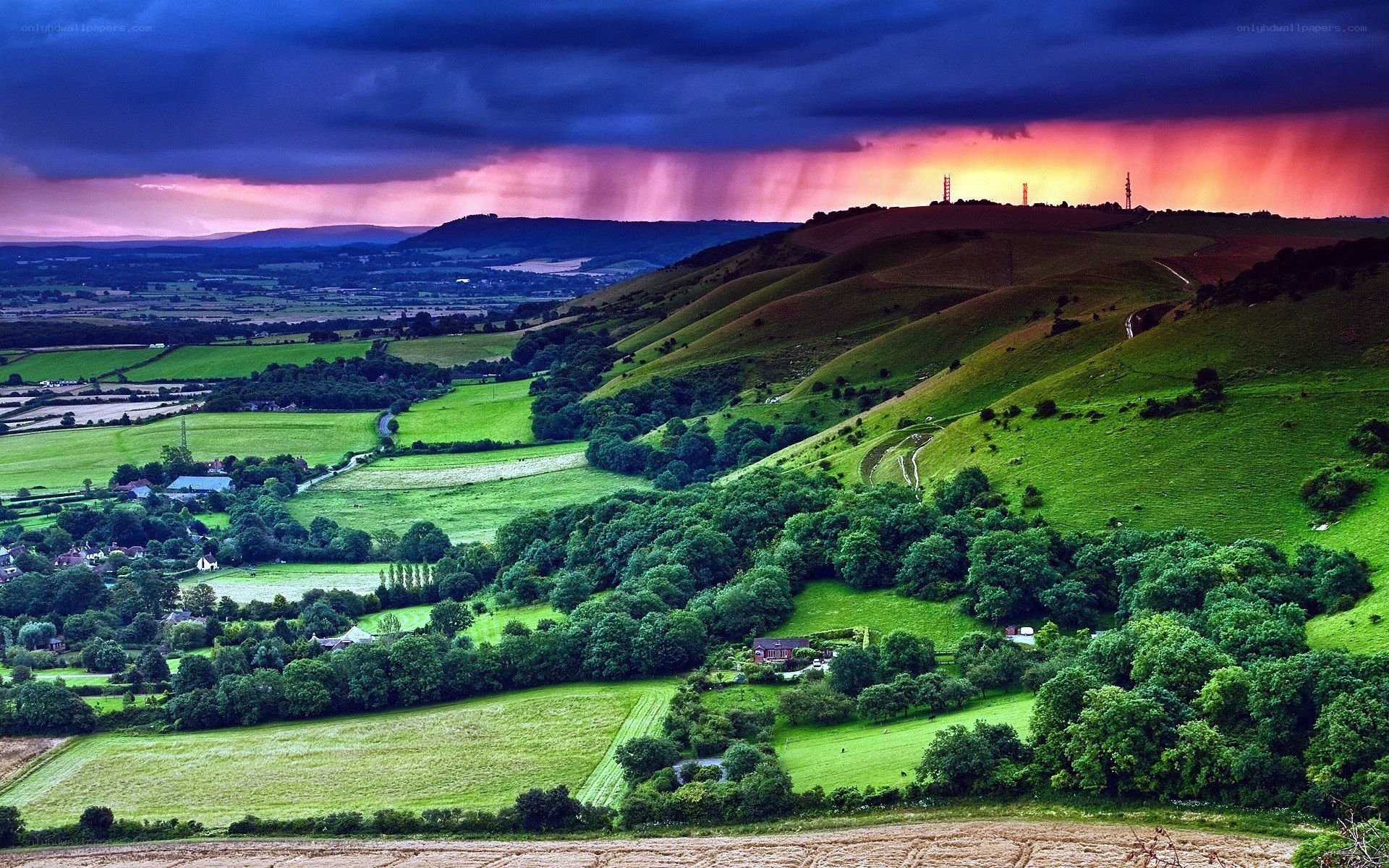 dramatic sunset over rolling hills