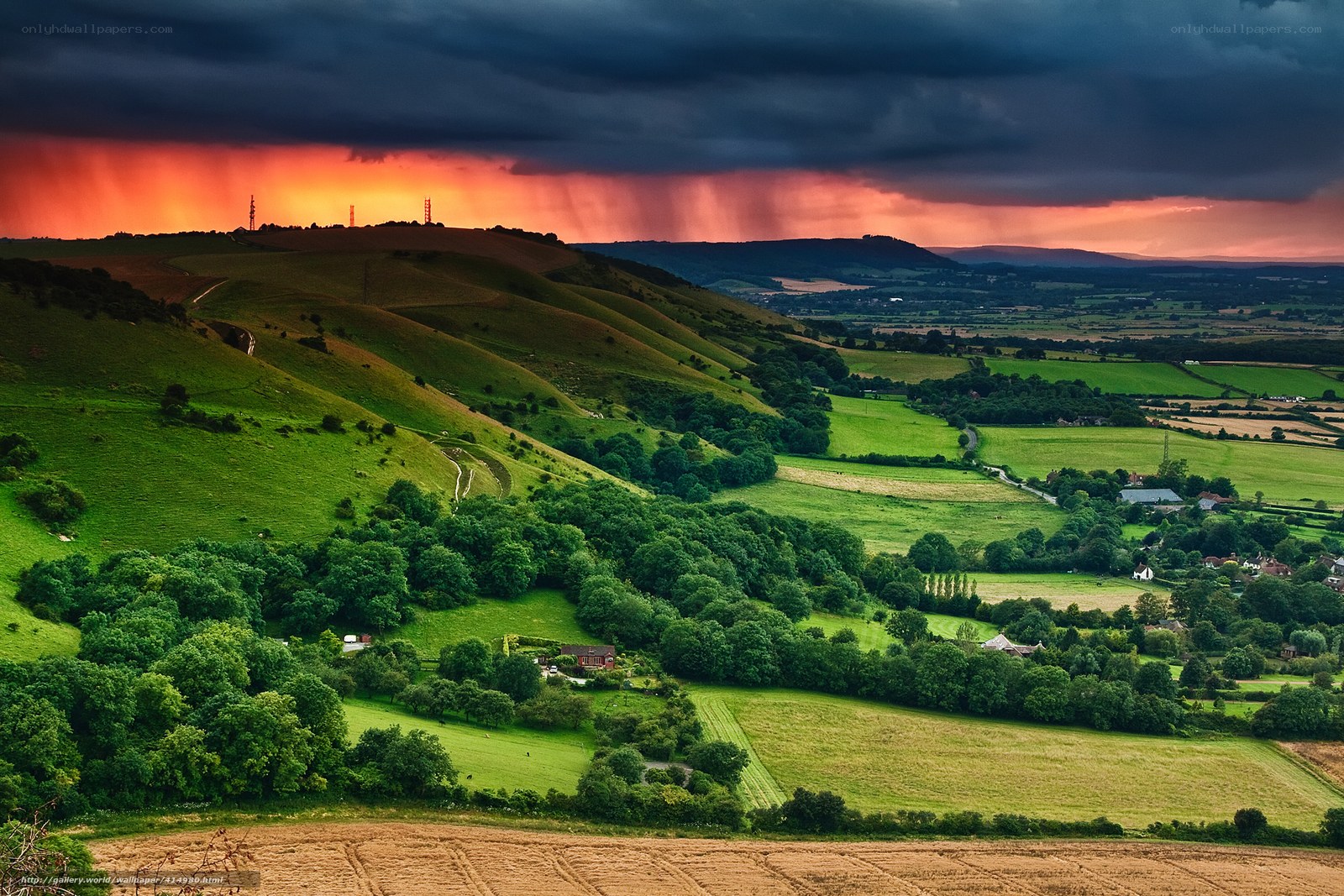 Dramatic sunset over rolling hills