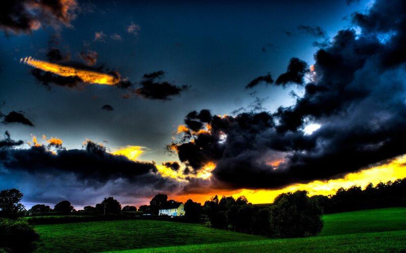 Dramatic sunset over rural landscape