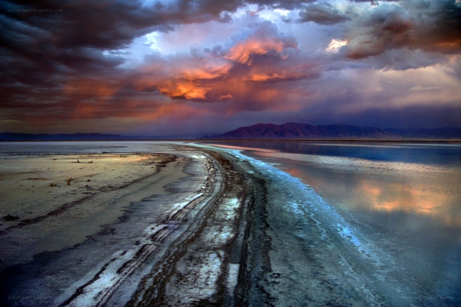 Dramatic sunset over salt flats