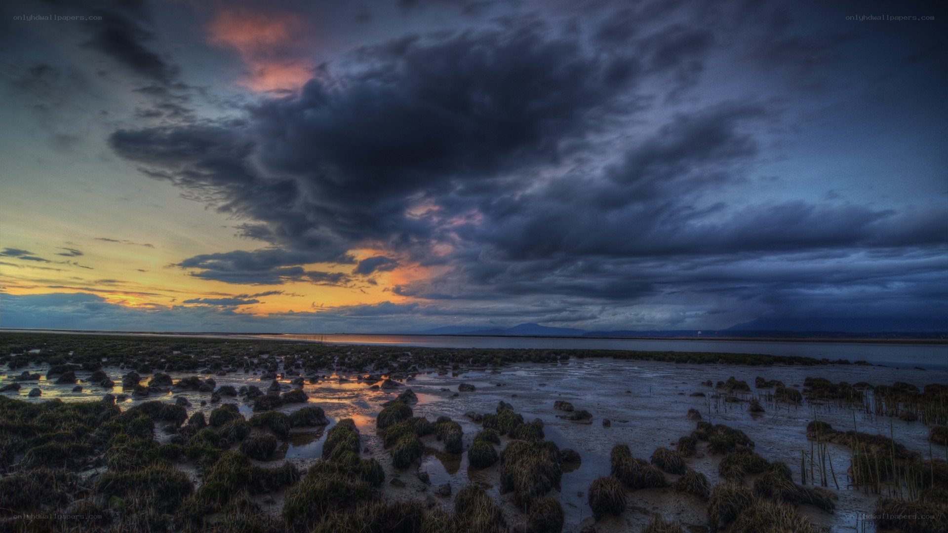 Dramatic sunset over tidal flats
