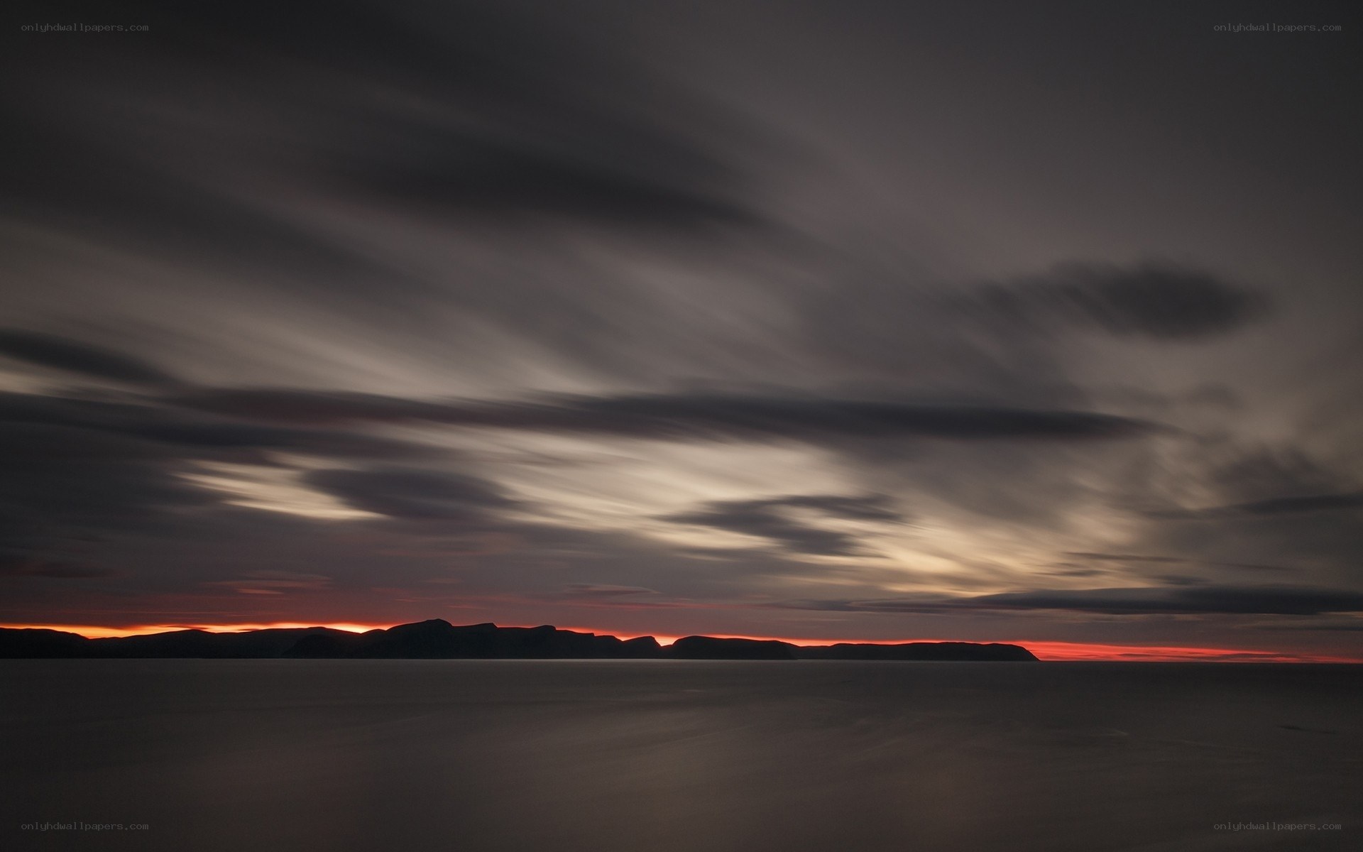 Dramatic sunset over water