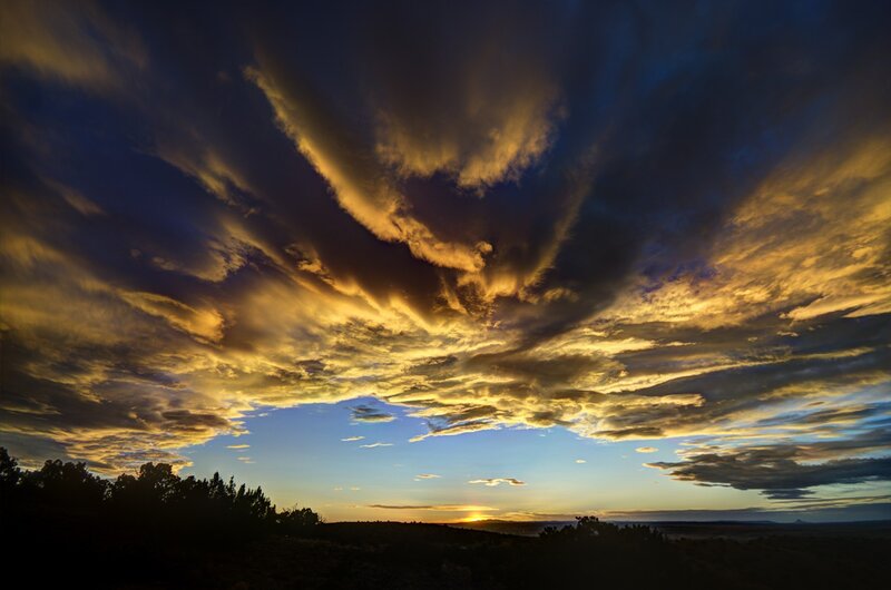 Dramatic sunset with golden clouds