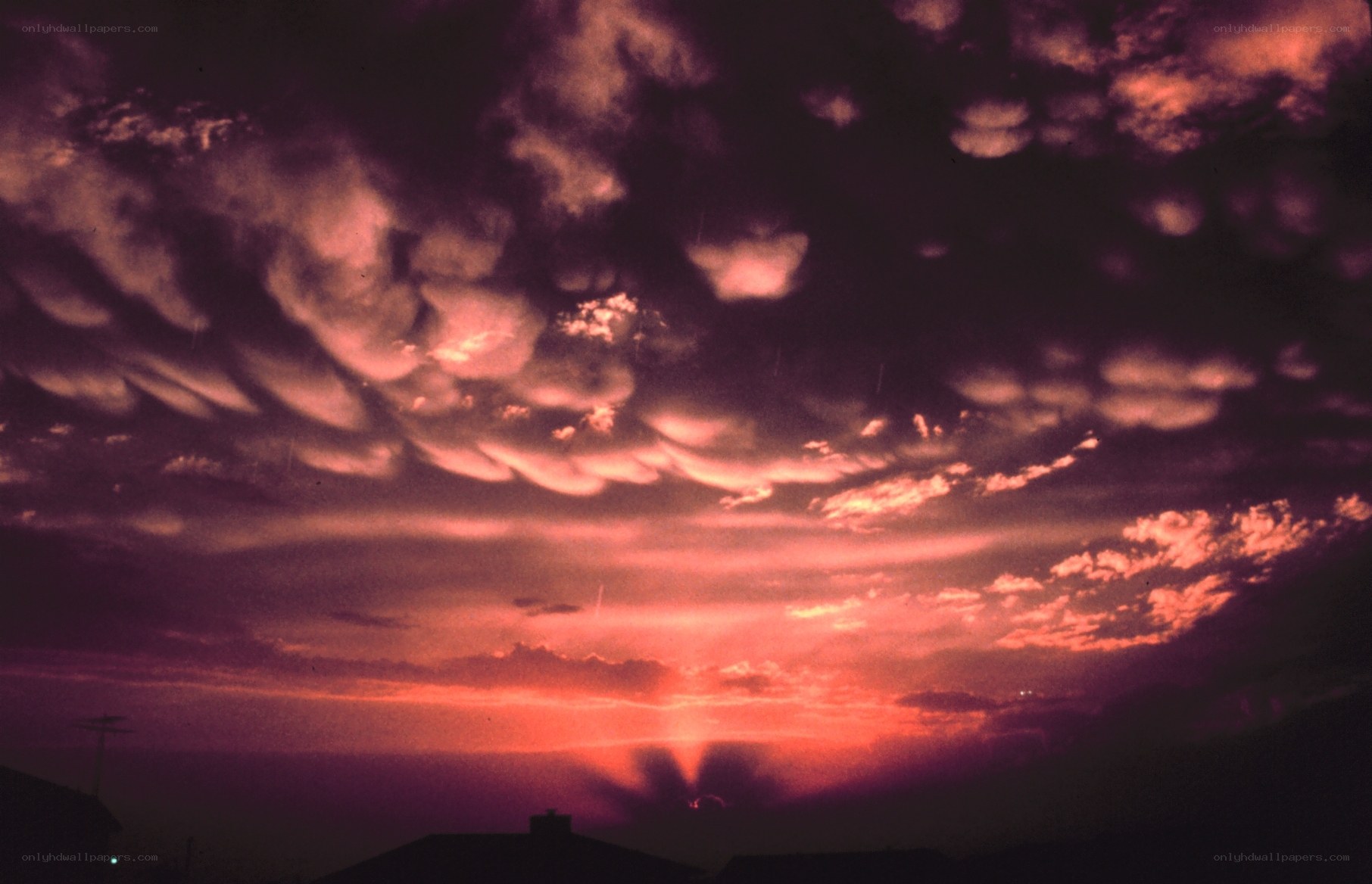 dramatic sunset with mammatus clouds