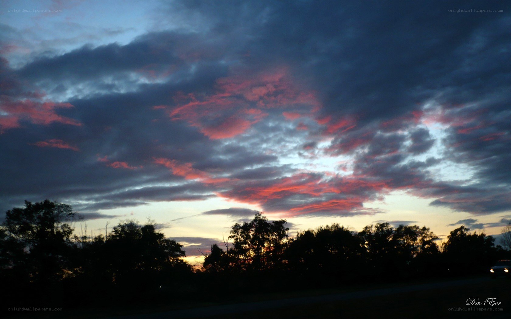 dramatic sunset with pink clouds